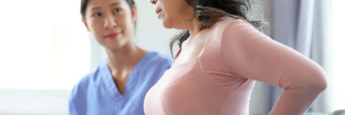 Dolor de espalda por el clima húmedo en Bilbao: causas y soluciones